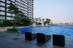 Homey and Wonderful Studio at West Vista Apartment By Travelio